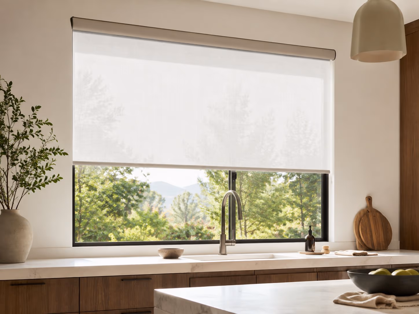 Light-filtering roller shades on a clean cassette in a bright Sonoma County home — Alta Roller Shades installed by Discount Best Blinds of Santa Rosa, CA.