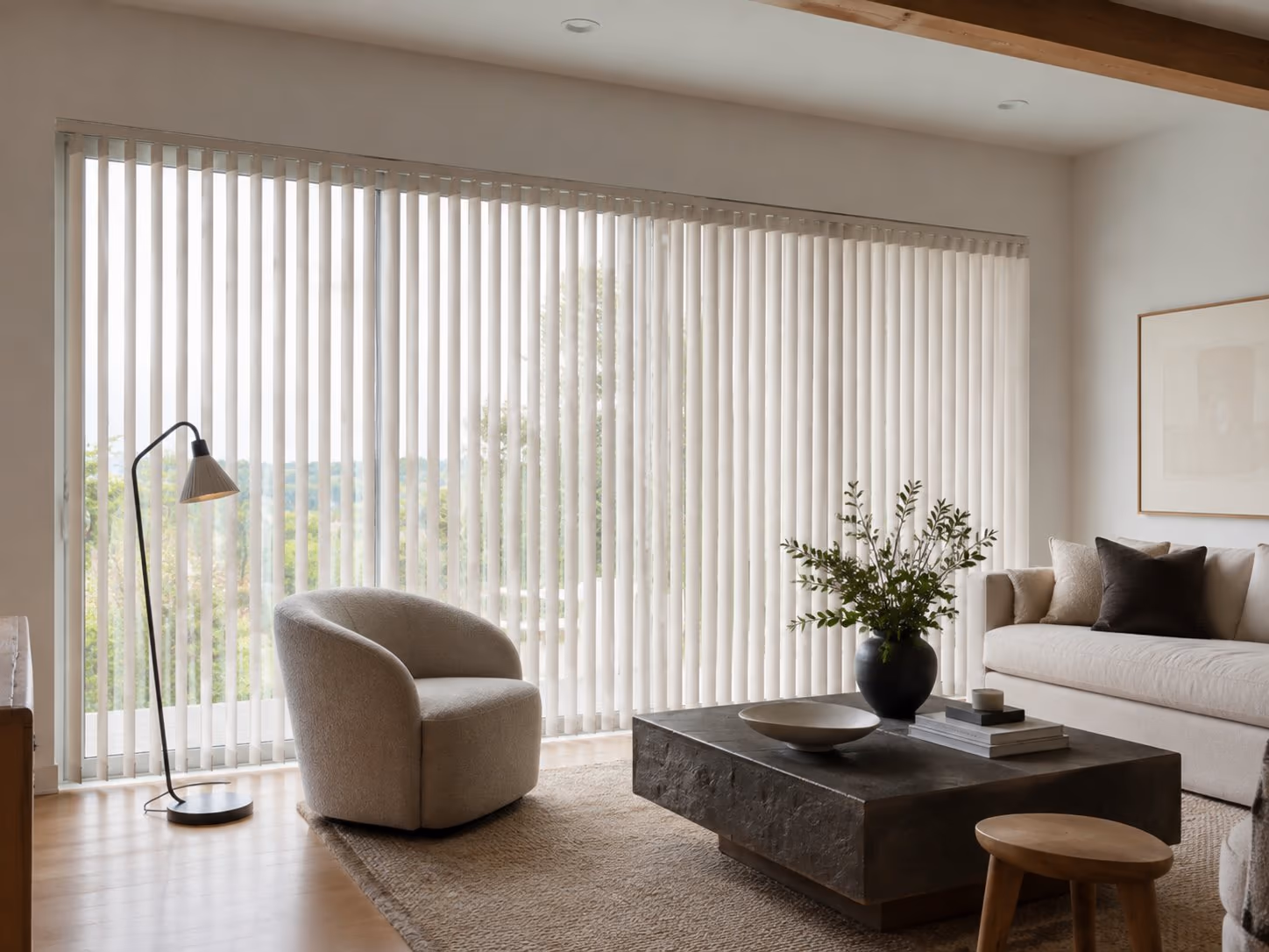 Fabric vertical blinds across a wide window in a bright Sonoma County home — Somner Vertical Blinds installed by Discount Best Blinds of Santa Rosa, CA.