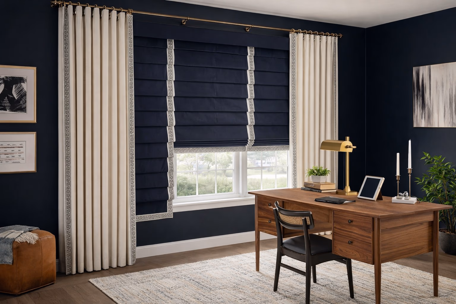 Hunter Douglas Design Studio Roman Shades paired with custom drapery panels with Greek key trim in a sophisticated navy blue home office, installed by Discount Best Blinds and Shutters